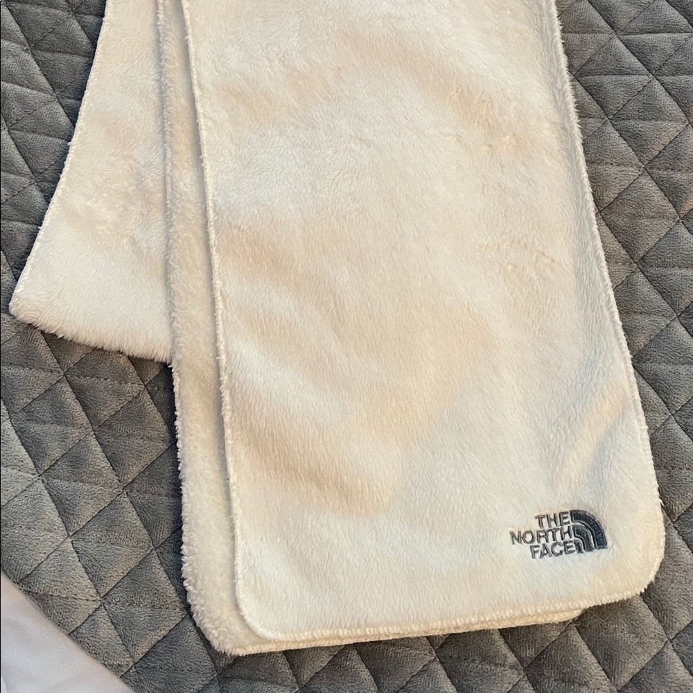 White fuzzy North Face scarf